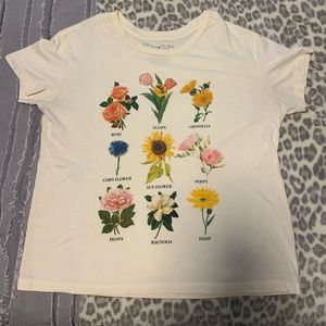 Graphic t-shirt with different kinds of flowers